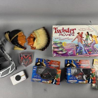Lot 585 | Knee Brace, Ceramic Native Americans, and More
