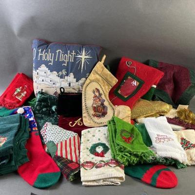 Lot 664 | Stockings, Christmas Towels & More

