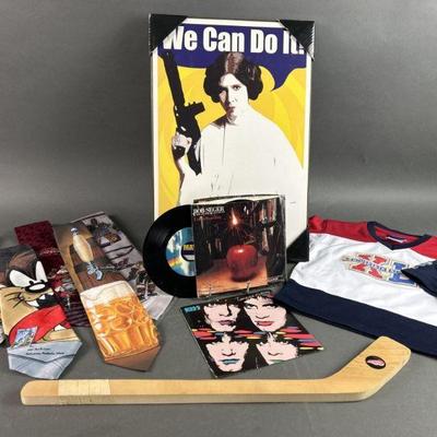 Lot 653 | Quirky Fun Princess Lea, Beer Ties, 45s & More

