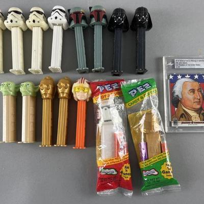 Lot 245 | Star Wars Pez Dispensers & Famous Fabrics Card
