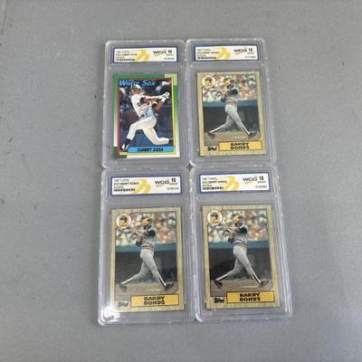 Lot 129 | 4 Gem-Mint Topps Cards
