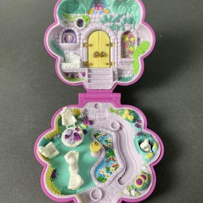 Lot 542 | ‘90 Polly Pocket Garden Surprise Bluebird Compact
