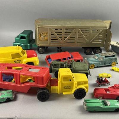 Lot 602 | Vintage Plastic and Metal Cars and Truck Toys
