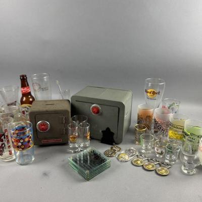 Lot 589 | Vintage Glasses, Safes, Thermos, and More
