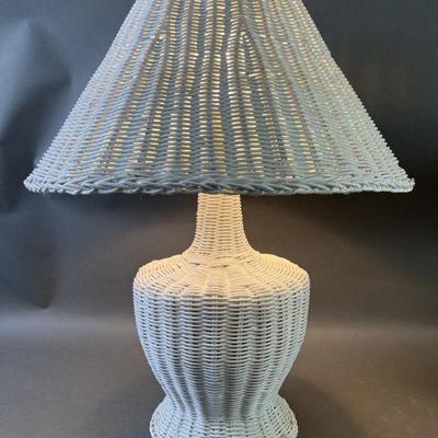 Lot 638 | White Rattan Wicker Lamp With Attached Shade

