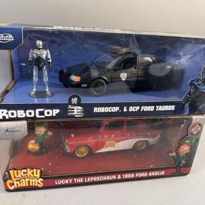Lot 252 | Die Cast Car and Figures

