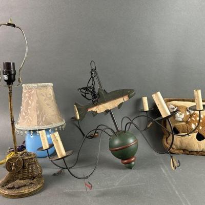 Lot 651 | Fish Chandelier, Small Lamps, Deer Pillow & More

