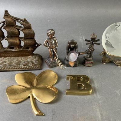 Lot 590 | Die Cast Bookend & Souvenirs & Glass Globe
