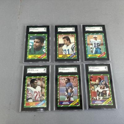Lot 133 | 1986 Topps Mint Graded Football Cards

