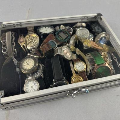 Lot 255 | Assortment of Fashion Watches and Case
