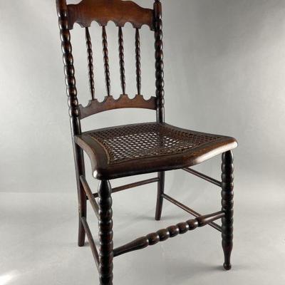 Lot 486 | Antique Cane Seat Sewing Chair
