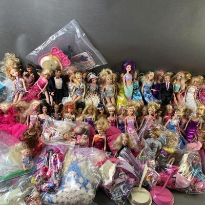 Lot 648 | Barbies Kens, Stacys, Clothes, Accessories & More
