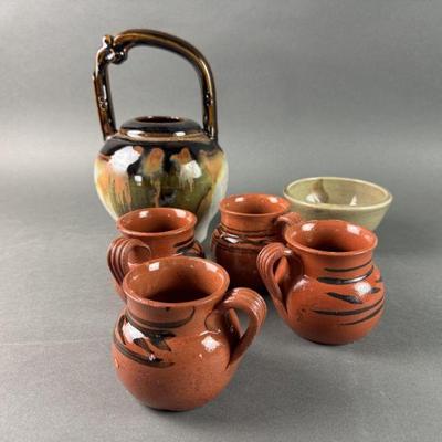 Lot 398 | Redware Terracotta Mugs and More
