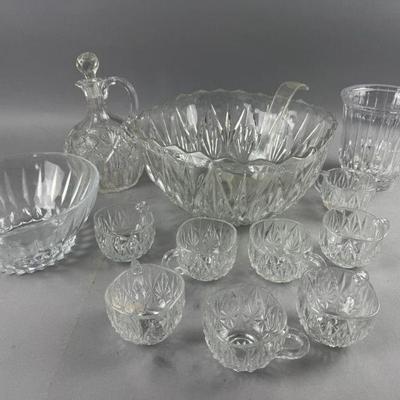 Lot 567 | Whiskey Jug and Serving Bowl / Cups and More
