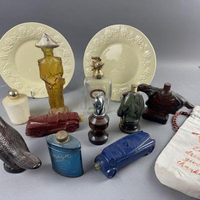 Lot 586 | Vintage Cologne Bottles, Plates, and More
