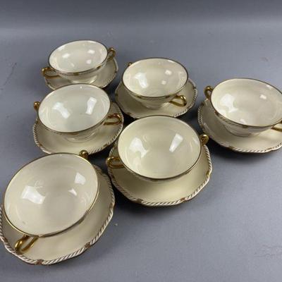 Lot 305 | 6 Black Knight Soup Bowls / Saucers
