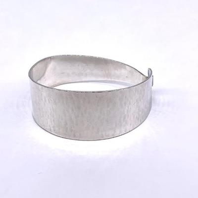 Hammered sterling cuff bracelet, signed Heintze, possibly Renate Heintze.