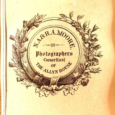 Included in this album is a rare portrait photograph from the NA Moore studio in Hartford