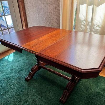 Lovely Legged Wood Table With Leaf
