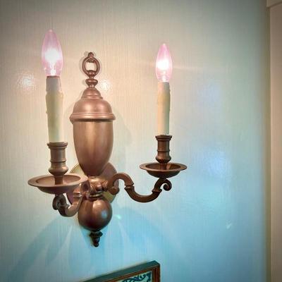 One of two vintage sconces