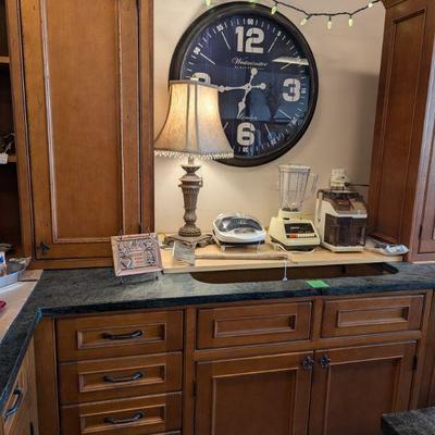 Large Wall Clock.  New Lamps.  New George Foreman   Press.  Blender. Juicer.  Copper Recipe or Photo Holder.  Extra Large Barbecue...