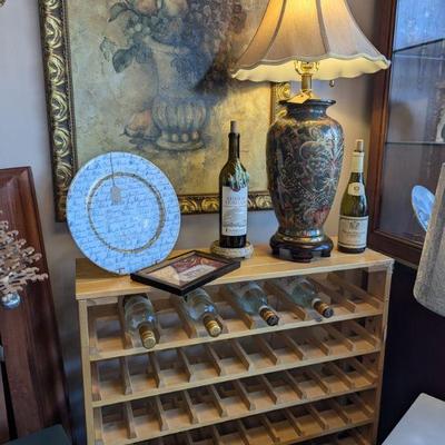 Large beverage bottle Rack.  Sturdy.  Lovely Asian Style Ceramic and Gold Lamp.  Truly Lovely.  Famous Chef's Decorator Plate....