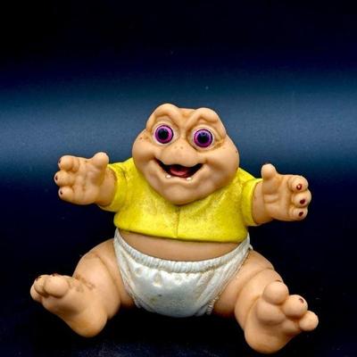 1991 Baby Sinclair Disney Dinosaur Toy
https://ctbids.com/estate-sale/31612/item/3566210/1991-Baby-Sinclair-Disney-Dinosaur-Toy