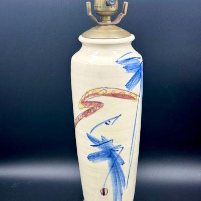 https://ctbids.com/estate-sale/31612/item/3566223/Signed-Pottery-Lamp
