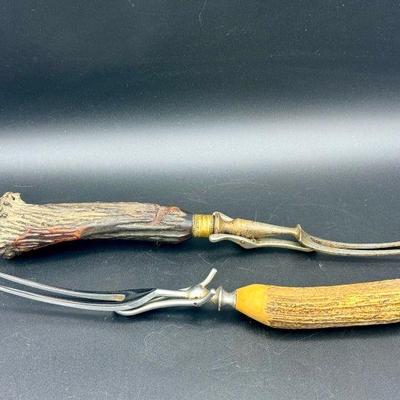 https://ctbids.com/estate-sale/31612/item/3566228/2-Antler-Serving-Forks