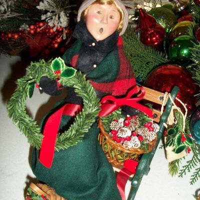 Byers Choice "Winterthur" Figurine on bench.