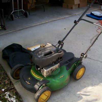 John Deere Push Lawnmower with Clippings bag and paperwork.