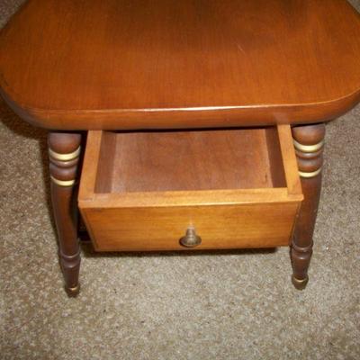 Drawer under chair seat.