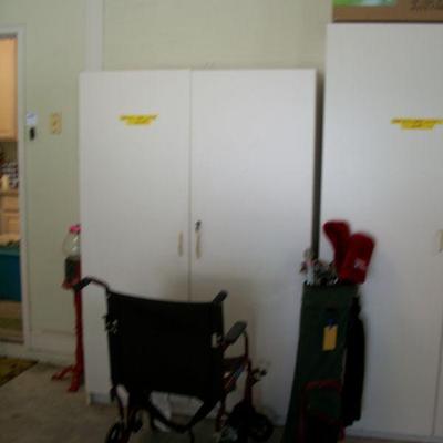 Sale Photo Thumbnail #101: Medium Size 2 door Cabinet ; 3 - Wheelchairs ; Golf clubs & Bag.