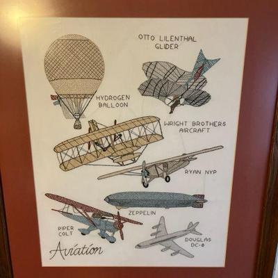 Framed needlepoint art
