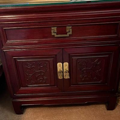 2 matching oriental bedside cabinets