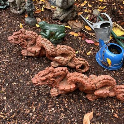 Cement dragons yard art 