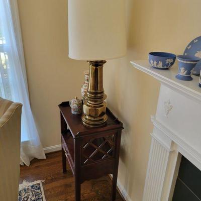 mahogany stands, brass lamps