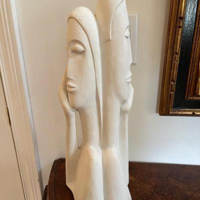 modern sculpture of two figures in the style of Modigliani