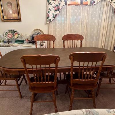 Oak dining table w/6 pressed back chairs, 1 leaf, 3 pc pad protector
$450