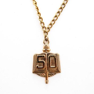 Gold-Tone Torch Book Tie Bar
