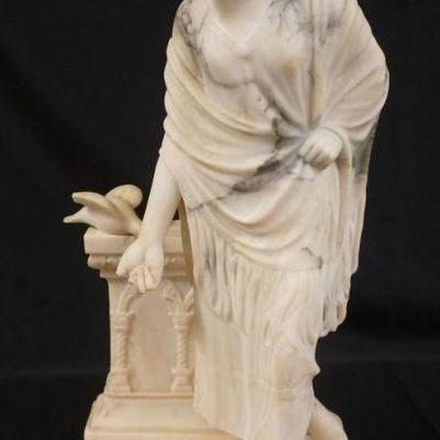 1029	CARVED MARBLE BUST OF WOMAN FEEDING PIGEONS, SOME LOSS TO CARVING, APPROXIMATELY 6 IN X 9 IN X 20 IN HIGH

