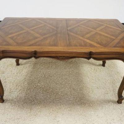 1157	WALNUT FRENCH PROVINCIAL DINING TABLE W/PULL OUT SURFACE LEAVES, APPROXIMATELY CLOSED 66 IN X 42 IN X 30 IN, OPEN APPROXIMATELY 112 IN
