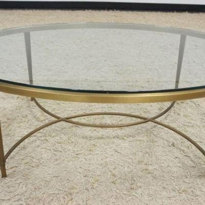 1110	ITALIAN OVAL BRASS GLASS TOP COCKTAIL/COFFEE TABLE, APPROXIMATELY 48 IN X 31 IN X 17 IN HIGH
