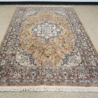 1173	PERSIAN FINE WOVEN SILK RUG W/IMAGES OF FLOWERS & URNS, APPROXIMATELY 10 FT X 6 FT
