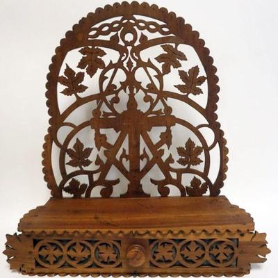 1095	WOOD FRETWORK HANGING SHELF W/DRAWER AT BASE, APPROXIMATELY 17 IN X 6 IN X 19 IN HIGH
