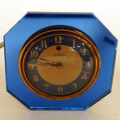 1251	VINTAGE BLUE MIRROR DECO TELECHRON ELECTRIC CLOCK, APPROXIMATELY 5 IN X 5 IN
