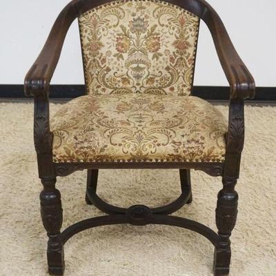 1105	CARVED OAK UPHOLSTERED BARREL BACK CHAIR
