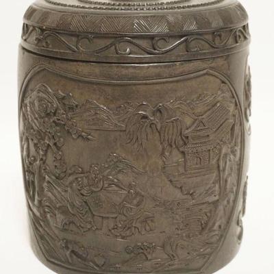 1014	ASIAN WOOD CARVED COVERED JAR W/CARVED IMAGES ALL AROUND, APROXIMATELY 7 1/2 IN HIGH
