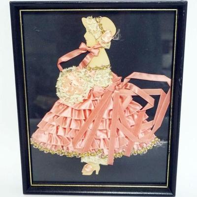 1228	RIBBON ART FRAMED DOLL, APPROXIMATELY 9 IN X 11 IN OVERALL
