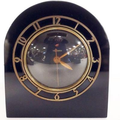 1254	VINTAGE DECO STYLE BLACK ONYX GLASS ELECTRIC CLOCK, APPROXIMATELY 6 IN X 7 IN
